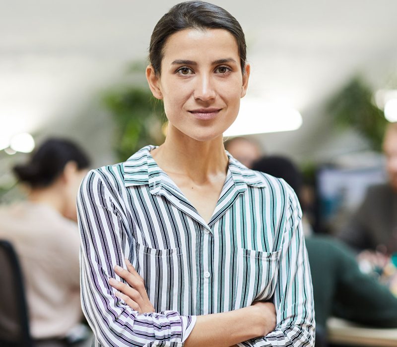 contemporary-businesswoman-posing-in-office.jpg